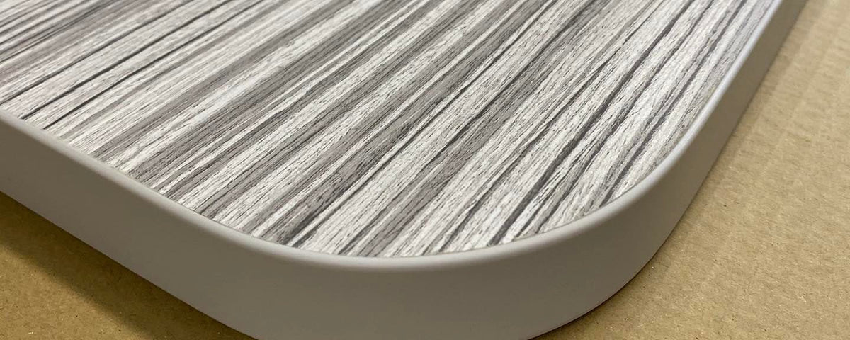 Laminated table top with a rounded corner and ABS edging, made at Chippy's Workshop