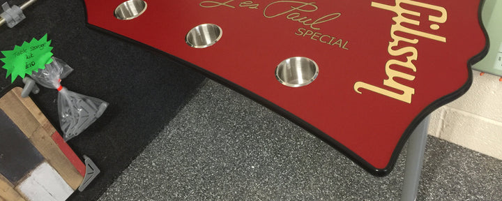 Finished Gibson headstock camper table on its leg, made for Toby Lee
