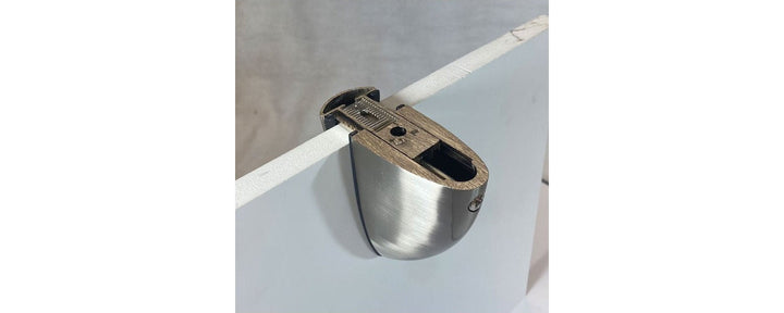 Häfele adjustable shelf clamp used to fit a motorhome shelf without drilling