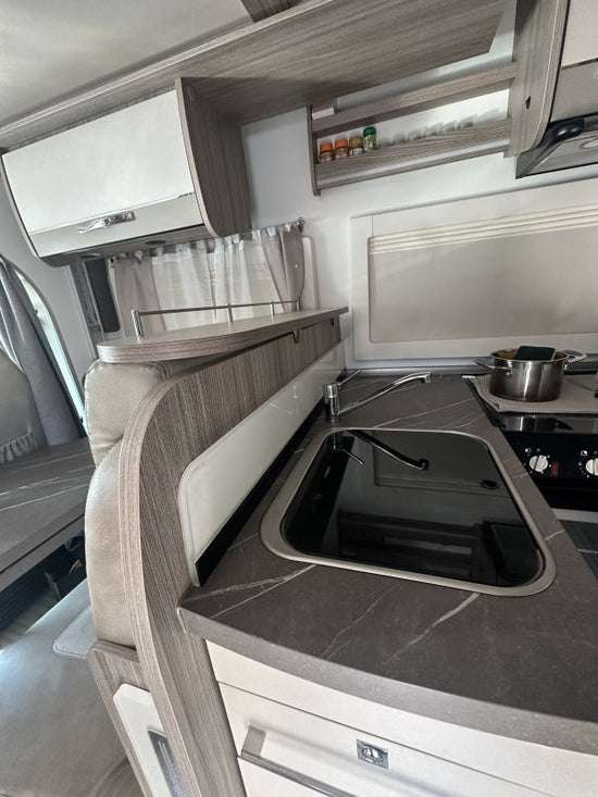 Benimar 294 shelf fitted behind the travel seat